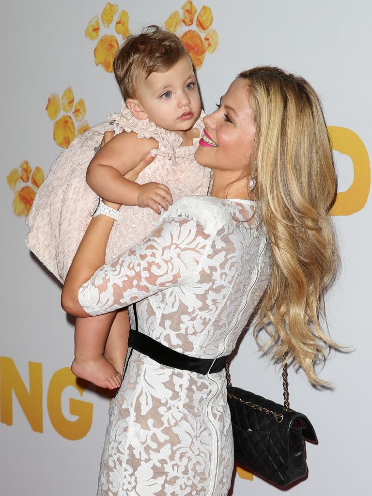 Tammin Sursok arrives with daughter Phoenix Emmanuel at the Australian premier of Paddington. Picture: Andrew Murray