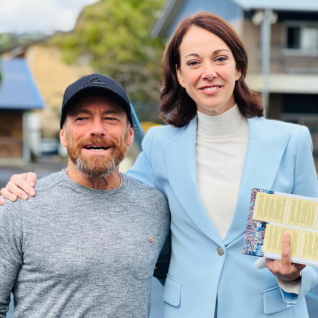 Mackellar independent candidate Sophie Scamps with some high-profile federal election support on Saturday – two-time world surfing champion Tom Carroll. Picture: Facebook (Sophie Scamps)