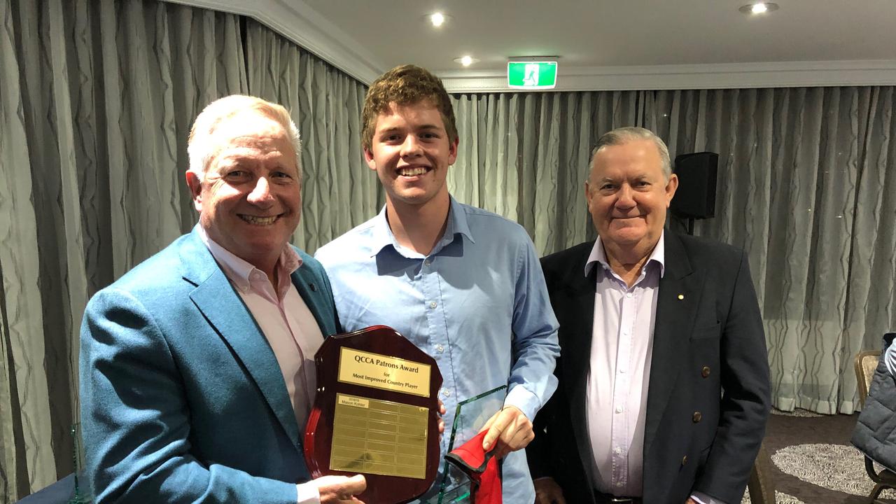 Sam Neale (centre) receives his Most Improved Country Player award from QCAA patron Ian Healy (left) and QCAA president Kev Maher. Photo: Contributed