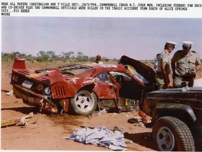 Motor car racing - fatal accident at the world’s first legal Cannonball Run near Alice Springs, Northern Territory. A Ferrari F40 spun out of control and into a four-wheel-drive vehicle at a race checkpoint. Driver Akihiro Kabe, co-driver Takeshi Okano and two Darwin control officials Tim Linklater and Keith Pritchard were all killed 24 May 1994. (News pic, Derek Moore)