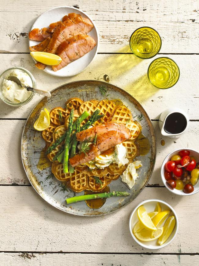 Waffles with salmon bacon, asparagus and maple syrup.