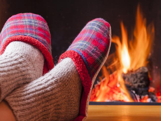 relaxing at the fireplace on winter evening