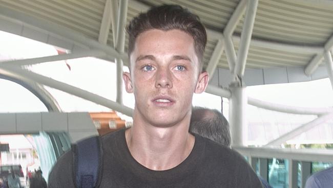 Australian teenager Jamie Murphy walks to depart to Perth at Bali International Airport. Picture: AAP Image/Johannes Christo