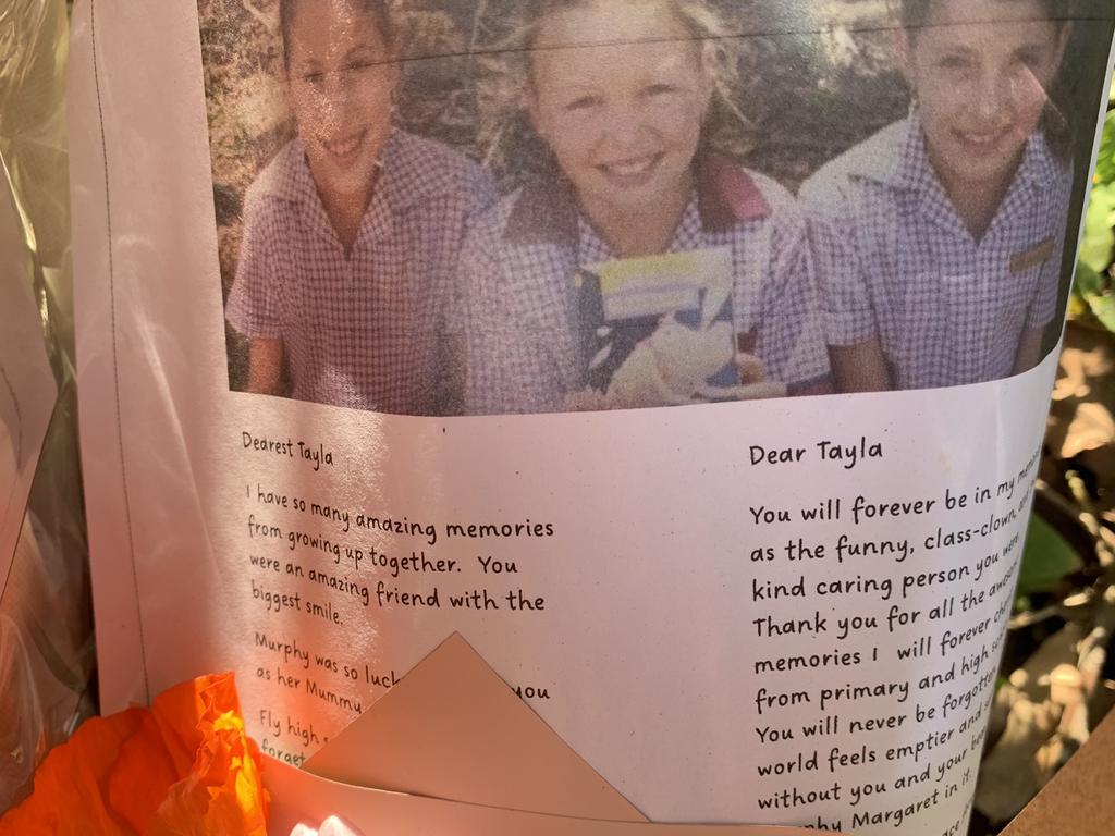 Tributes left by family, friends and members of the community at the house where Tayla Black and baby Murphy Margaret lived before allegedly murdered on August 8, 2023.