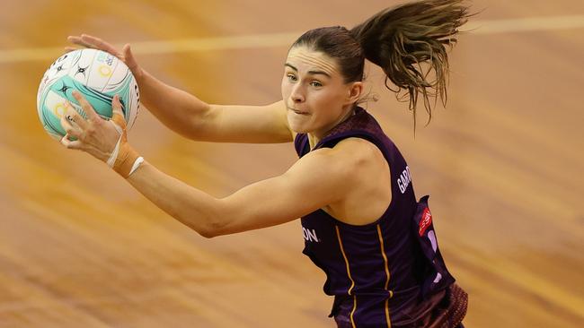 Macy Gardner of the Firebirds competes for the ball during the clash against Sunshine Coast Lightning. Photo: Getty Images