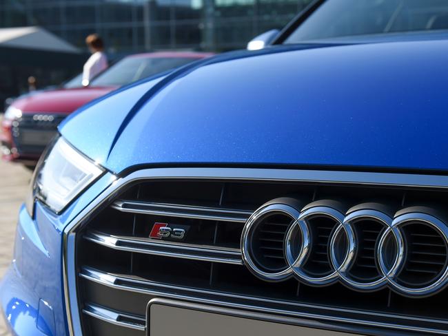 The logo of German carmaker Audi is seen on Ausi S3 car on the sidelines of the Audi AG annual general meeting in Ingolstadt, southern Germany, on May 9, 2018. / AFP PHOTO / CHRISTOF STACHE