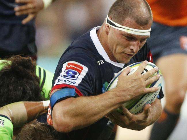 Luke Jones of the Rebels is tackled during the Round 3 Super Rugby match between the Melbourne Rebels and the Highlanders at AAMI Park in Melbourne, Friday, March 1, 2019. (AAP Image/Daniel Pockett) NO ARCHIVING, EDITORIAL USE ONLY