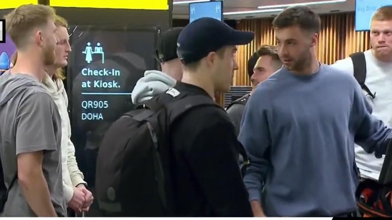 Essendon players spotted at Melbourne Airport. Picture: 7NEWS