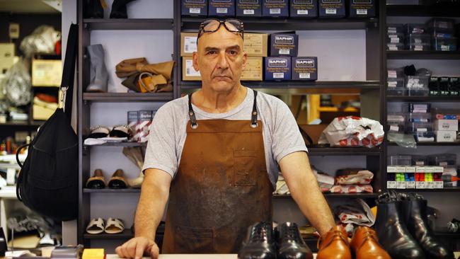 Cobbler Robert Atallah wants the option of paying cash for his cuppa. Picture: Sam Ruttyn