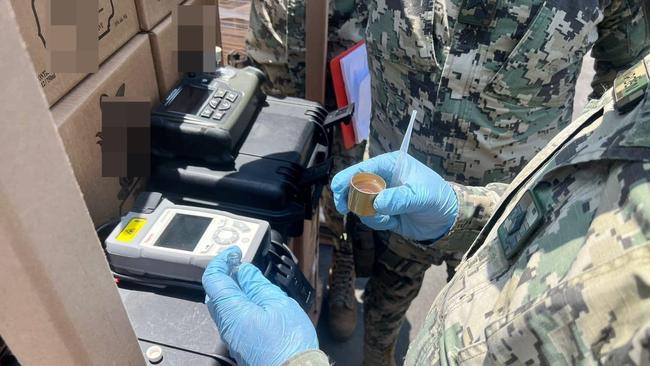 A photo released by the Mexican Navy shows boxes of liquid meth concealed in bottles of tequila, seized at the port of Manzanillo. Picture: SECRETARÍA DE MARINA/SEMAR