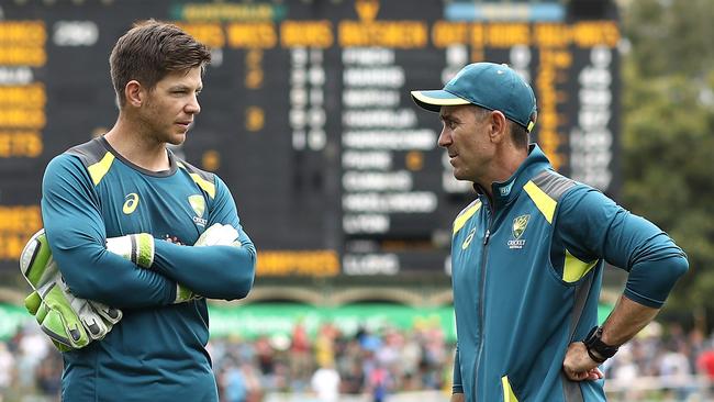 Tim Paine, left, has been forced to isolate following the emergence of the Adelaide COVID-19 cluster. Picture: Getty Images