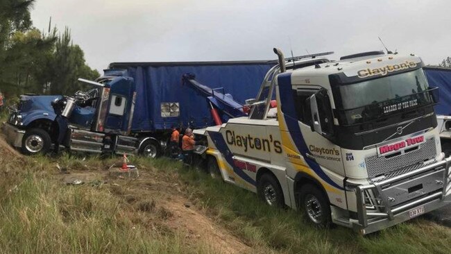 The wreckage of a B-double and car crash heading northbound on the Bruce Hwy, near the Caloundra exit in Landsborough. Picture: Win News