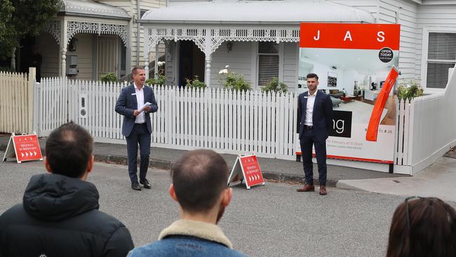 Tate Moore auctioneer. Seddon couple Tam and Anthony Bulloch, who abandoned plans to sell their home as Melbourne's tough, weeks long stage-four lockdown tanked the city's property market have sold their home today. Saturday, FEBRUARY 27, 2021. Picture: David Crosling