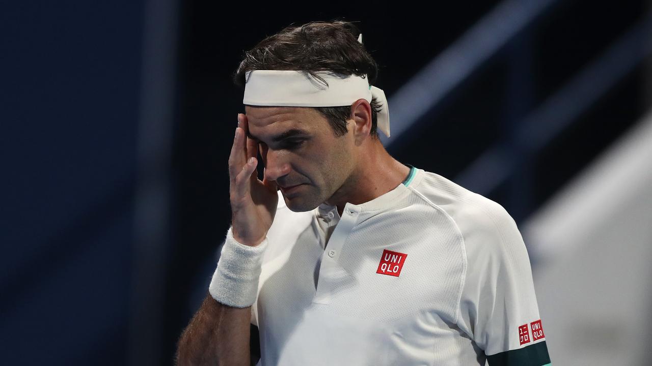 Roger Federer reacts during his quarterfinal loss to Nikoloz Basilashvili in Doha, Qatar. (Photo by Mohamed Farag/Getty Images)