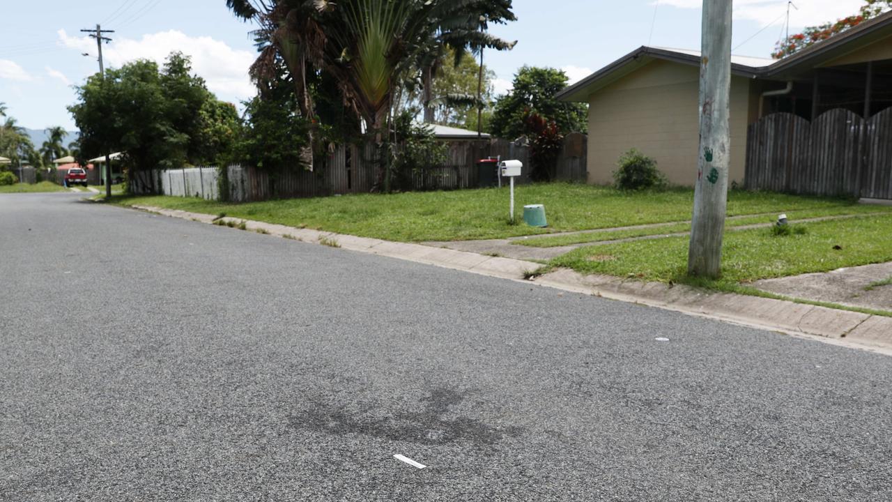 Scene of a fatal stabbing of a 17 year old Cairns boy at a New Year's Eve house party in Lychee Close, Manoora. A fight occurred on the street, resulting in two males being stabbed around 1am on Saturday January 1, 2022. Blood stains on the road where the two boys were treated by paramedics. Picture: Brendan Radke