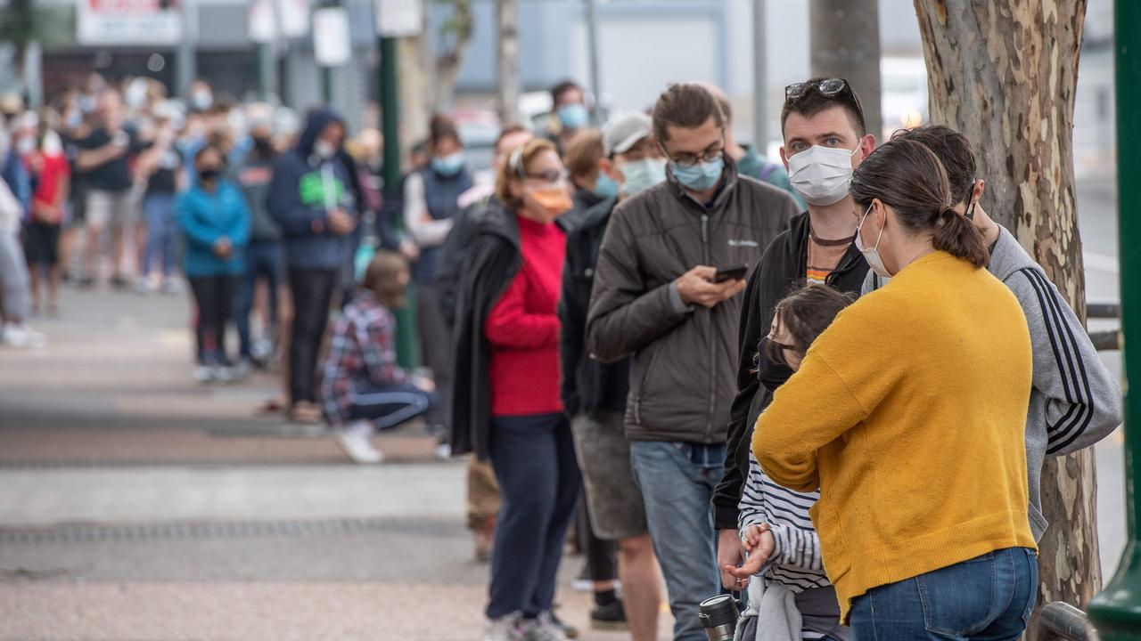 A long line of people waiting for Covid-19 test at a Toowong Village site. Picture: Brad Fleet