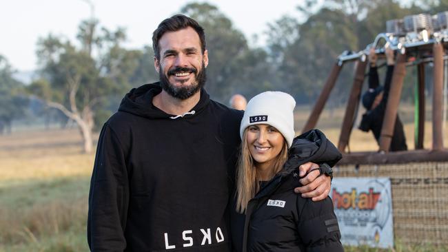 Locky Gilbert, with girlfriend Irena Srbinovska, took a hot air balloon to skydive over the Gold Coast Hinterland in local Gold Coast activewear brand, LSKD.