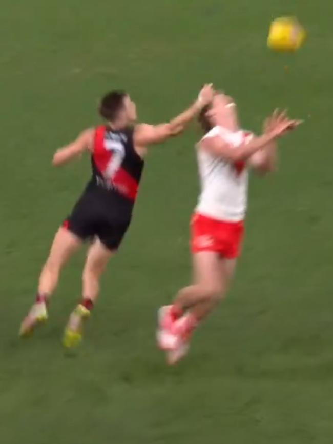 Merrett misses the ball and collects Blakey.