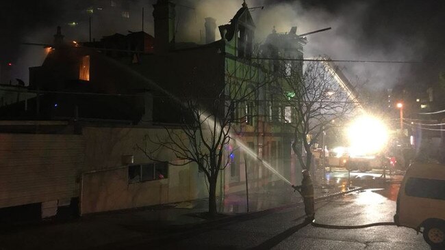 Firefighters on the scene of the Broadway Hotel at Woolloongabba overnight. Picture: Jacob Miley