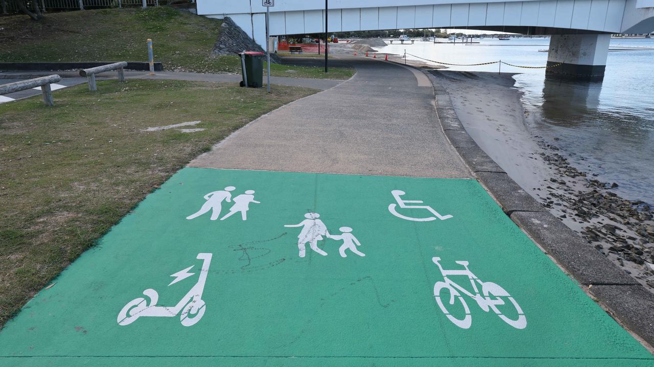 The sign painted by council on pathway at Paradise Point Esplanade which has caused confusion for locals. Picture: Glenn Hampson.