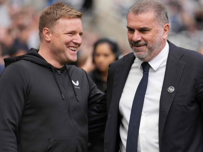 Newcastle United's English head coach Eddie Howe (L) and Tottenham Hotspur's Greek-Australian Head Coach Ange Postecoglou (R) chat ahead of kick-off in the English Premier League football match between Newcastle United and Tottenham Hotspur at St James' Park in Newcastle-upon-Tyne, north east England on April 13, 2024. (Photo by Andy Buchanan / AFP) / RESTRICTED TO EDITORIAL USE. No use with unauthorized audio, video, data, fixture lists, club/league logos or 'live' services. Online in-match use limited to 120 images. An additional 40 images may be used in extra time. No video emulation. Social media in-match use limited to 120 images. An additional 40 images may be used in extra time. No use in betting publications, games or single club/league/player publications. /