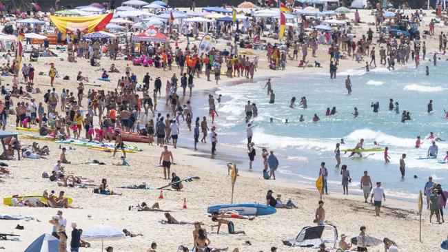 Thousands of people descended on Bondi Beach to beat the heat. Picture: NewsWire / Simon Bullard.