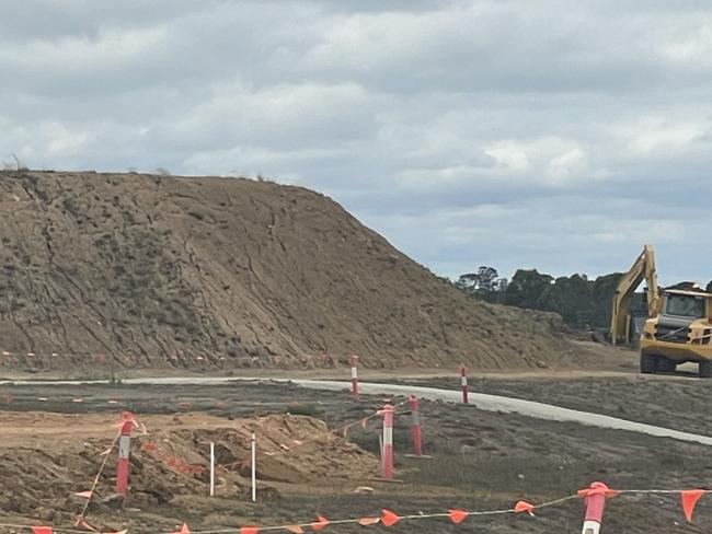 Pakenham locals have been engulfed by dust, coming from the Honora Estate developments on Ryan Rd. Massive dust piles upwards of 40m high have been dumped as close as 100m to residential homes. Picture: Gemma Scerri