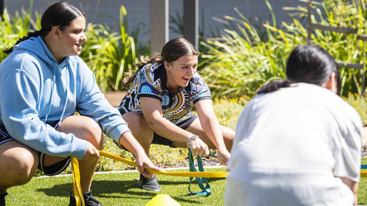 Project Booyah youth program participants Kadisha (left) and Holly on a team building problem solving exercise in Toowoomba at Denise Kable Youth Services Centre, Tuesday, March 12, 2024. Picture: Kevin Farmer