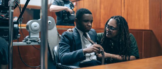 Power producer … <i>When They See Us </i>director Ava DuVernay guides one of her young actors during a court scene. Picture: Atsushi Nishijima/Netflix