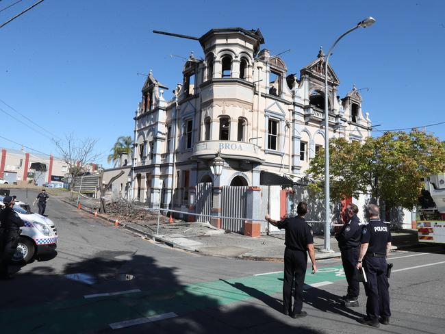 Police on the scene of the Broadway Hotel fire at Woolloongabba. Picture: Annette Dew