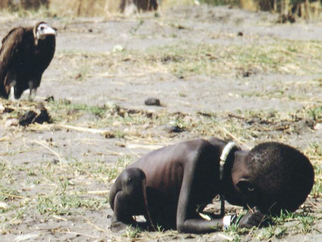 *ONE TIME WEB USE ONLY* March 1993, Sudan --- Vulture Watching Starving Child --- Image by © Kevin Carter/Sygma/Corbis