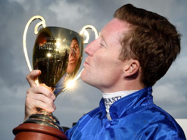 Winning jockey Pat Cosgrave saviours the moment. Picture: Nicole Garmston