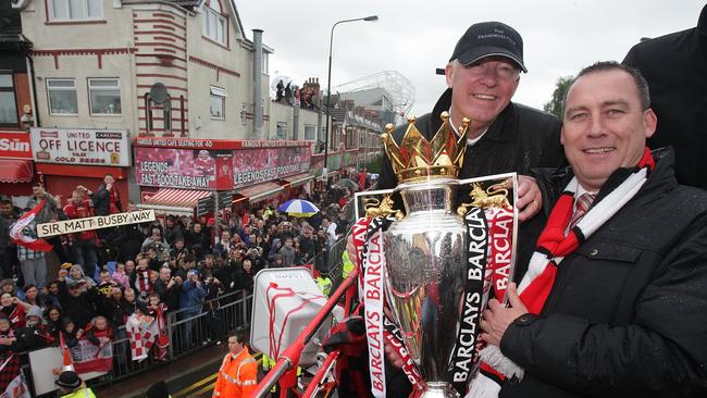 Sir Alex Ferguson, left, and Rene Muelensteen celebrate with the Premier League trophy in 2011 during Manchester United’s winners parade. Picture: Getty Images