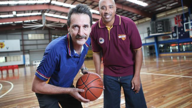 Retired Brisbane Capitals GM Trevor Lidstone with CJ Bruton from the Brisbane Bullets. Picture: Ric Frearson