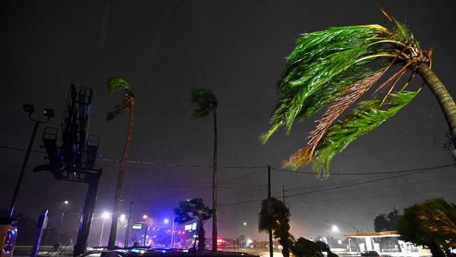 Palm trees bend in the wind after Hurricane Milton made landfall in Brandon, Florida on October 9. Picture: AFP