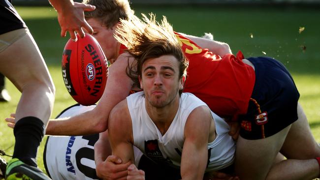 Vic Country v South Australia at Simonds Stadium, Country's Rhys Mathieson gets a handpass away. June 27th 2014. Picture : Colleen Petch