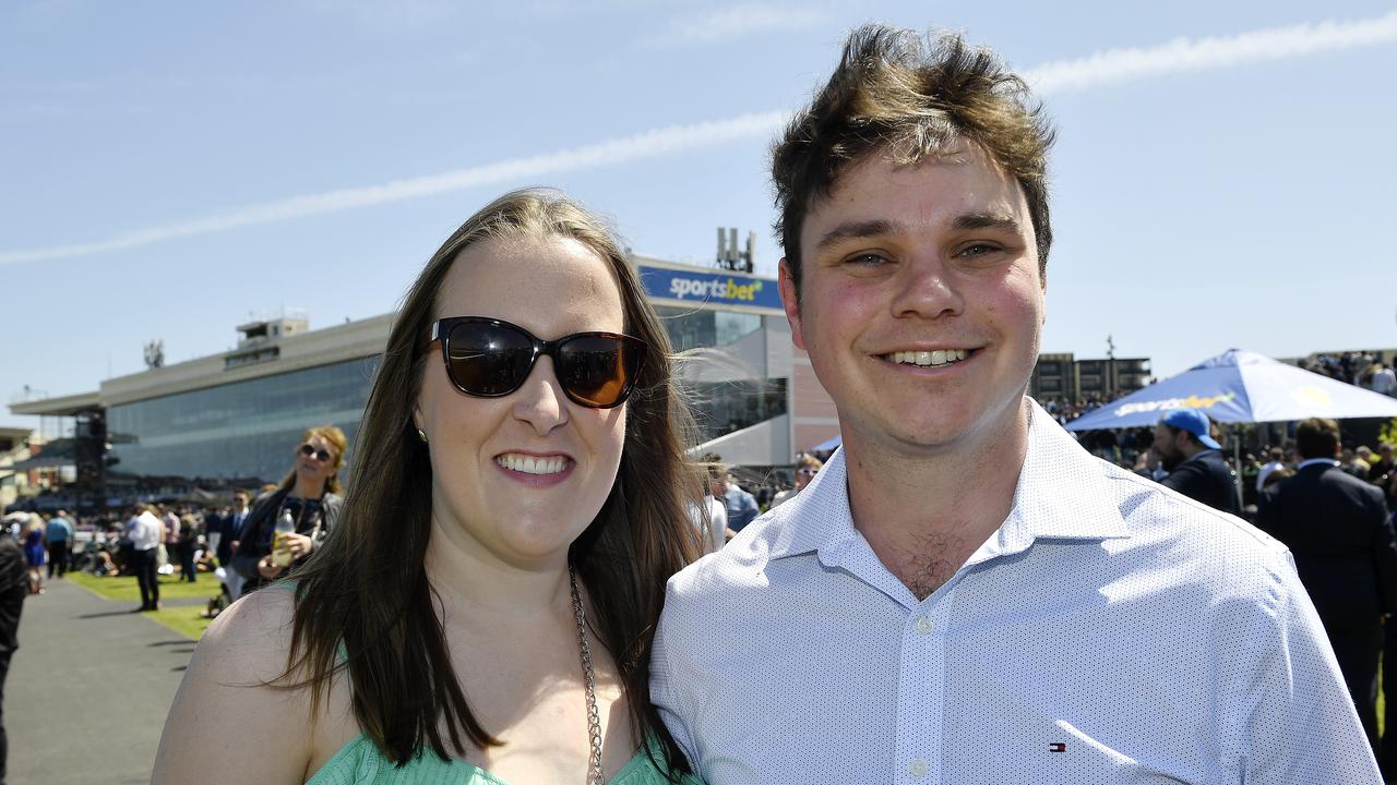 Caulfield Guineas horse race meeting, Caulfield, Victoria, Saturday 12th October 2024. Faces in the crowd. Pictured enjoying the race meeting are Sarah and Scott. Picture: Andrew Batsch