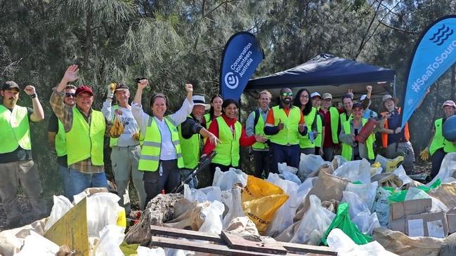 Volunteers with the massive haul of rubbish collected from the Duck Creek at Rosehill on April 24.