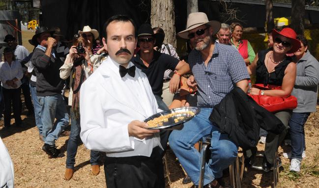 Manuel circulates the peanuts at the Faulty Towers Dining Experience. Picture: Craig Warhurst