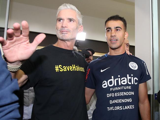 Craig Foster and Hakeem al-Araibi after al-Araibi's arrival at Melbourne Airport. Picture: Scott Barbour/Getty Images