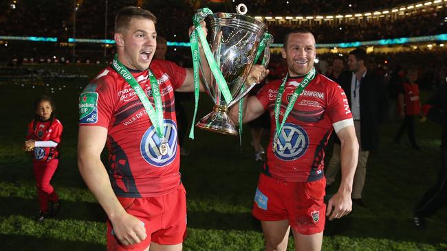 Drew Mitchell (left) and Matt Giteau celebrate Toulon’s Heineken Cup victory at the Millennium Stadium.