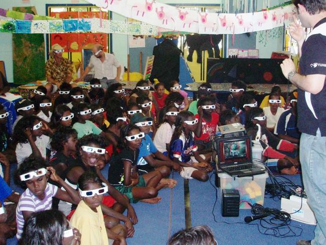 CLASSMATE. Chris Hendry (Engineers Australia SMART presenter) demonstrating to Shepherdson College (Galiwinku, Elcho Island) students how 3D entertainment is made. Pics supplied by Engineers Australia