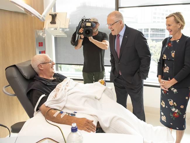 Prime Minister Scott Morrison (second left), Liberal candidate for Higgins Katie Allen (second right) and Minister for Health Greg Hunt (right) are seen during a tour of the Peter MacCallum Cancer Centre in Melbourne, Monday, March 25th, 2019. (AAP Image/Ellen Smith) NO ARCHIVING