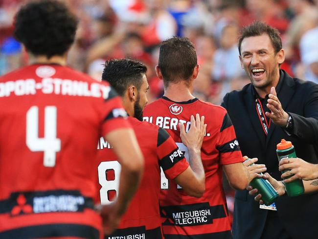 Tony Popovic, Coach of the Wanderers congratulates Alberto on his goal during the Western Sydney Wanderers v Newcastle Jets A League game at Pirtek Stadium, Parramatta. pic Mark Evans