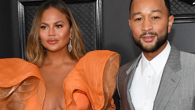 LOS ANGELES, CALIFORNIA - JANUARY 26: Chrissy Teigen and John Legend attends the 62nd Annual GRAMMY Awards at Staples Center on January 26, 2020 in Los Angeles, California. (Photo by Amy Sussman/Getty Images)