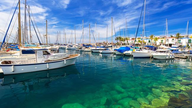 The clear water of Puerto de Mogan, on Gran Canaria, Spain ... just watch for the sharks behind fishing boats