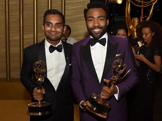 Actors/writer Aziz Ansari (L), winner of Outstanding Writing for a Comedy Series for ‘Master of None,’ and Donald Glover, winner of Outstanding Lead Actor in a Comedy Series for ‘Atlanta,’ attend the 69th Annual Primetime Emmy Awards Governors Ball. Picture: Kevin Winter/Getty Images