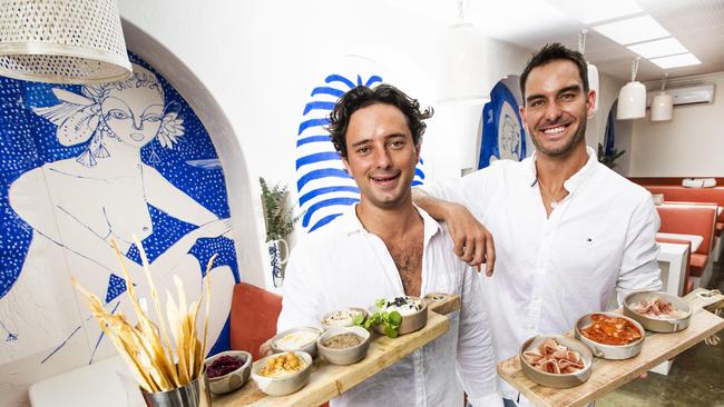 Champion ironman Matt Poole (right) with business partner Oliver Frost (left), with whom he's opening a new restaurant called Maman in Burleigh Heads. Picture: NIGEL HALLETT