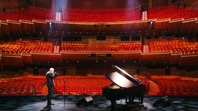 Paul Kelly and Paul Grabowsky (at piano) perform at an empty Hamer Hall in Melbourne for The Sound.