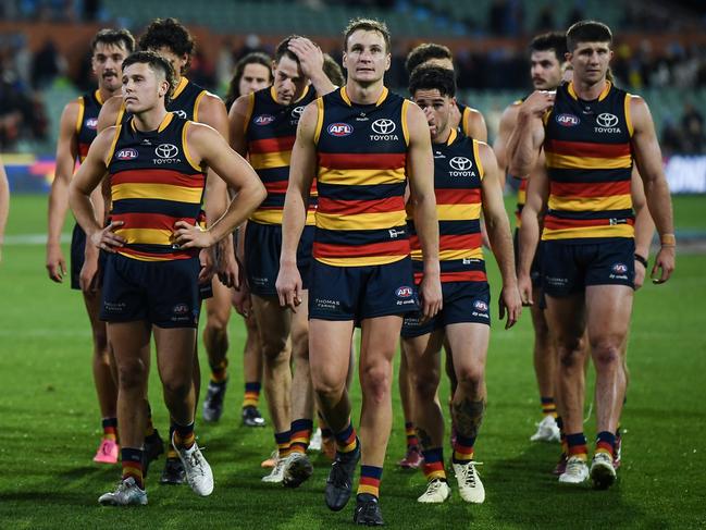 Jordan Dawson leads the Crows off the ground on Thursday night. Picture: Mark Brake/Getty Images